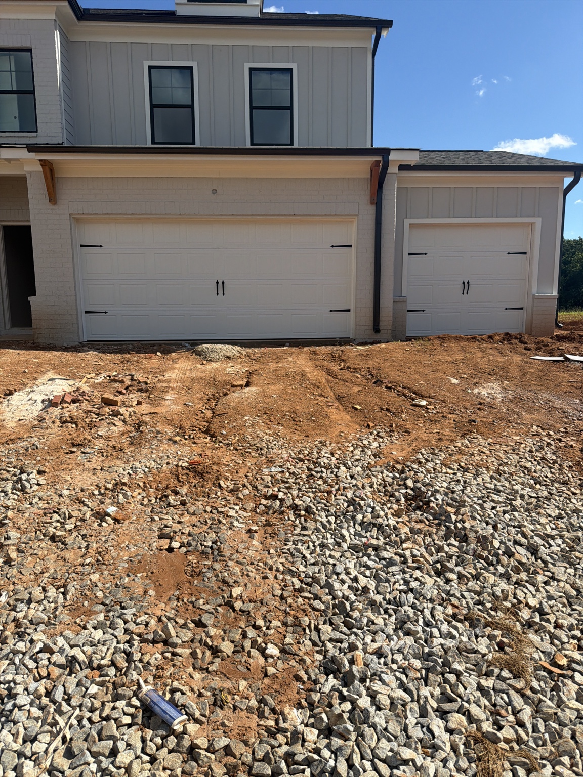 White garage doors on a new construction home
